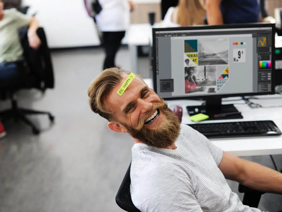 A smiling team member